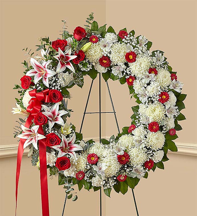 Red Rose and Lily Standing Wreath arranged by a florist in Bohemia, NY